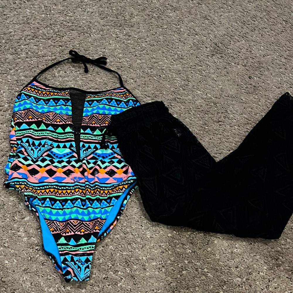 Juniors size large cute, one piece swimsuit with mesh pants also size large.